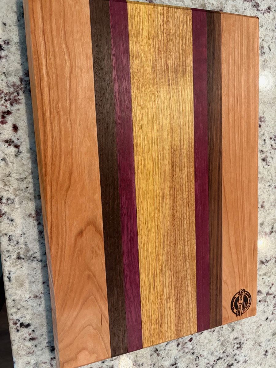 The Autumn Stripe — cherry, walnut, purpleheart, yellowheart cutting board