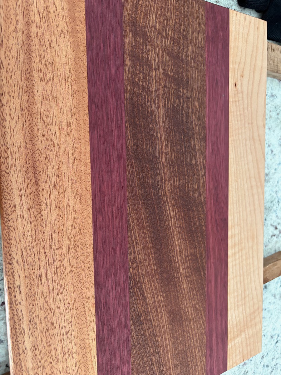 The Bold Four — mahogany, purpleheart, walnut, maple cutting board
