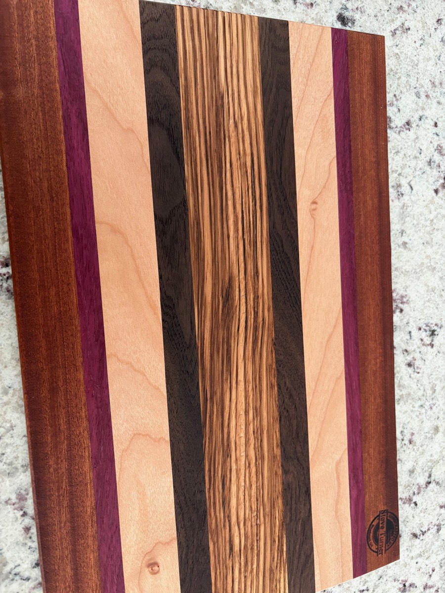 The Contrast — maple, walnut, wenge, purpleheart cutting board