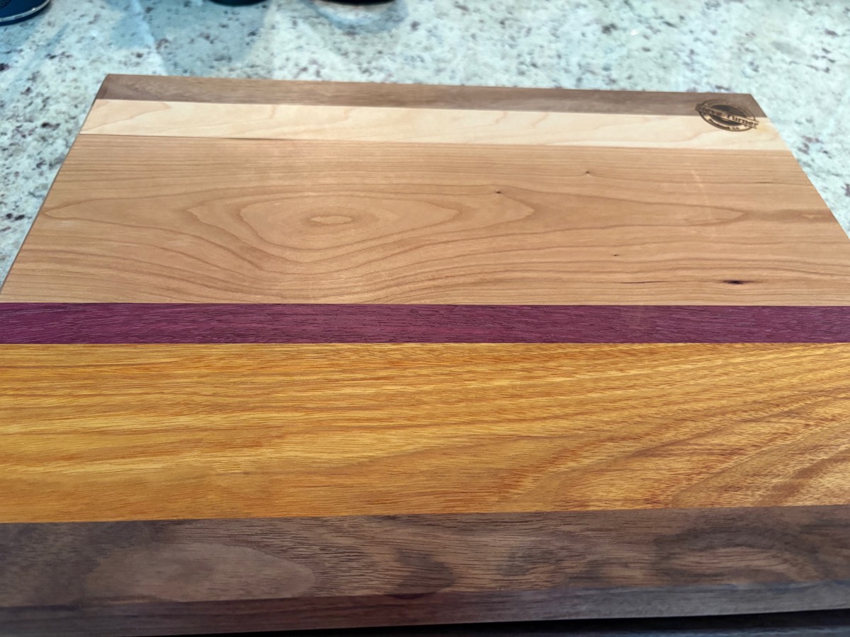 The Vineyard — cherry, purpleheart, yellowheart, walnut cutting board
